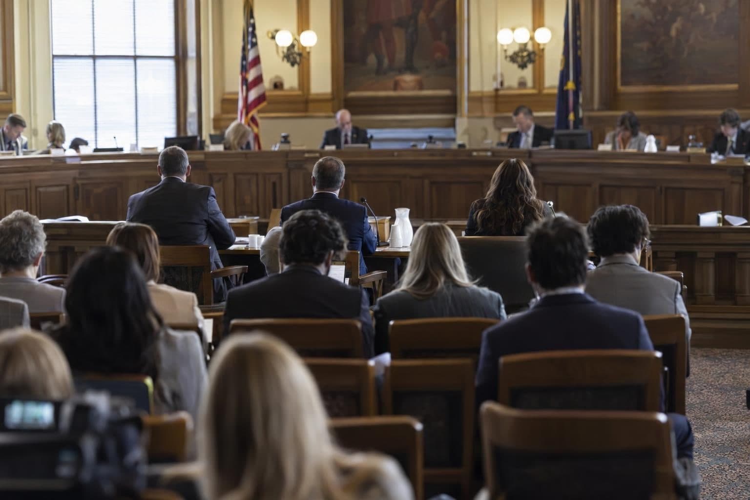 Anonymous state officials address lawmakers during a legislative hearing on Montana’s Medicaid work rules.