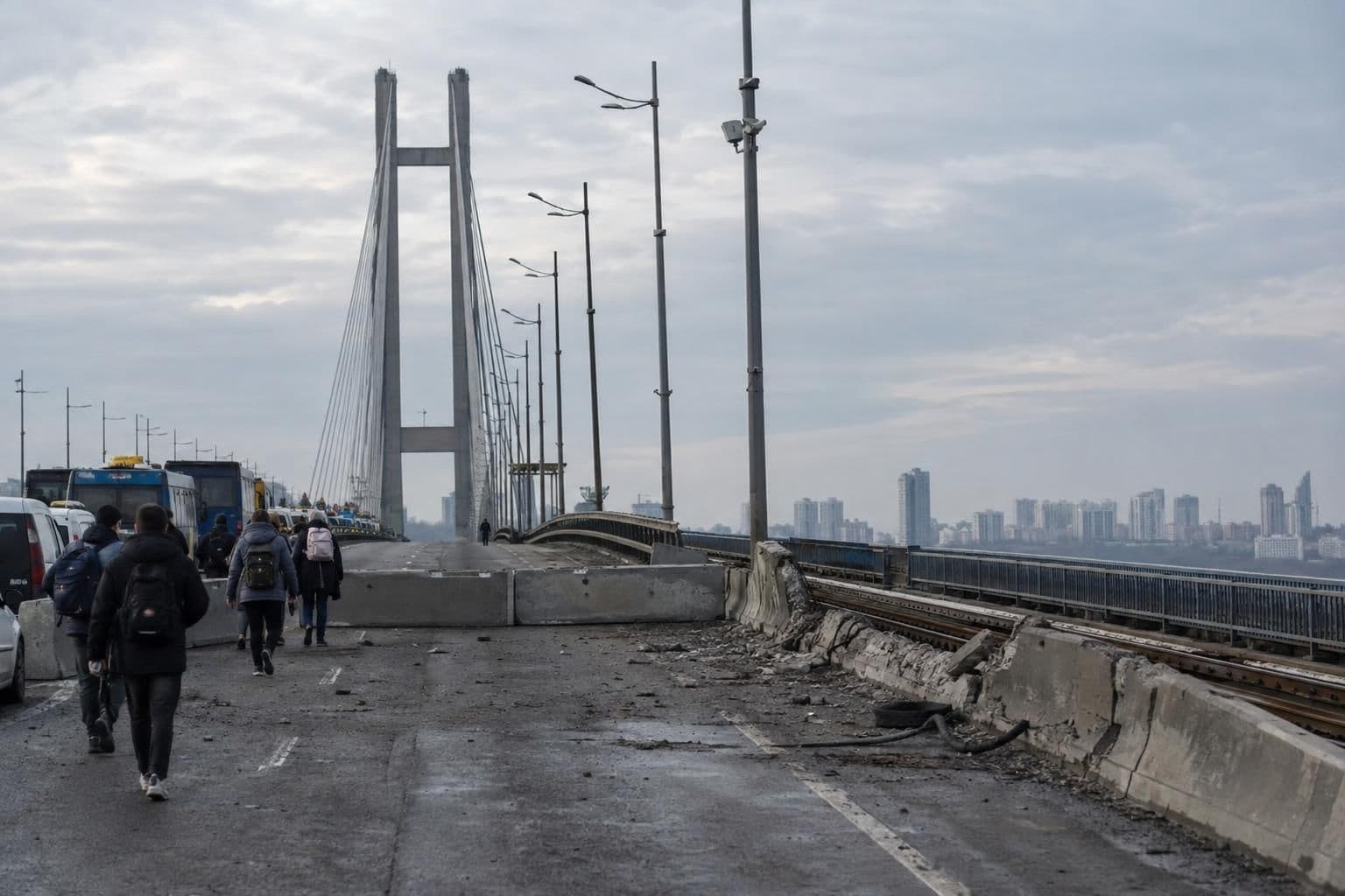 Kyiv’s Southern Bridge is closed after drone strikes as cars and buses queue on nearby roads.