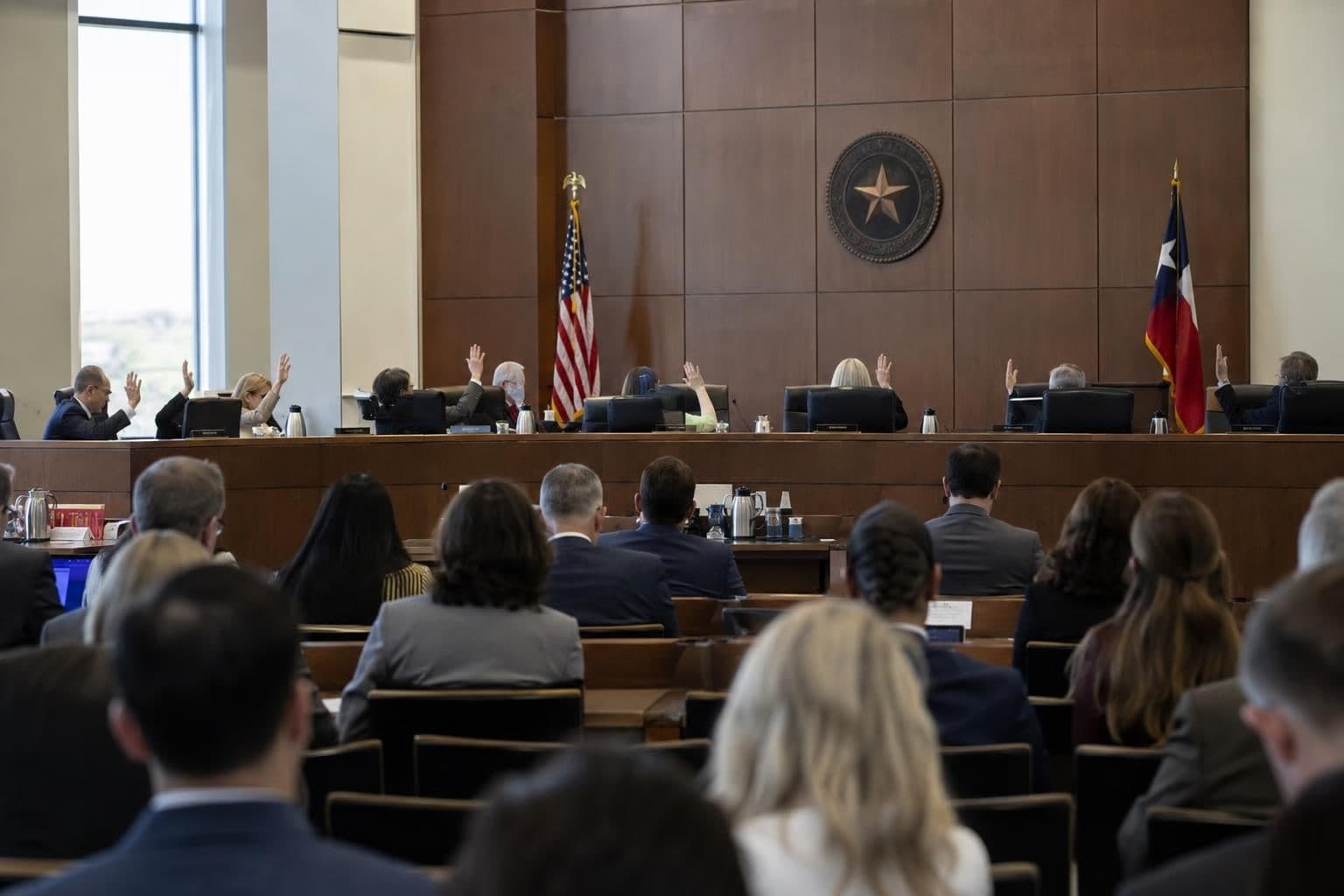 Texas education board members meet during a vote on a proposed charter school.