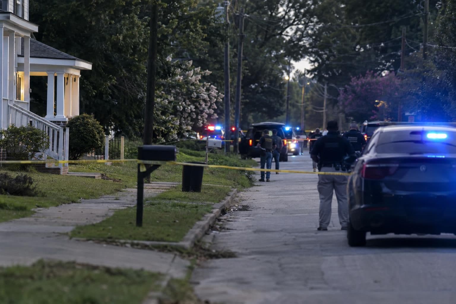 A residential street in Vienna, Georgia, after an overnight block-party shooting.
