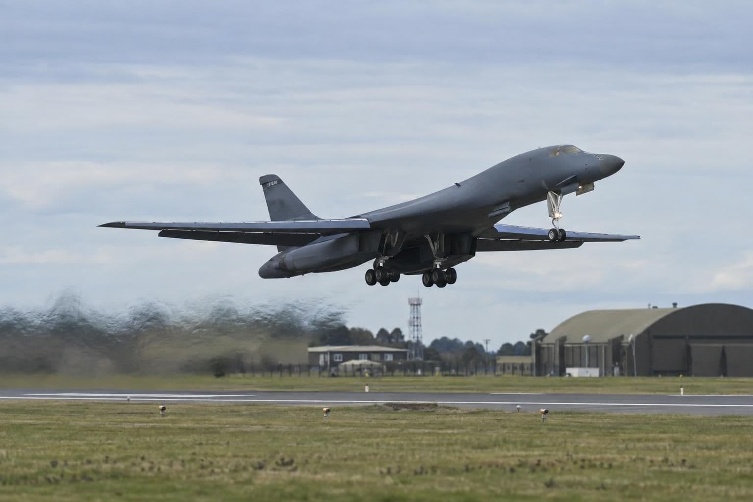 A B-1 bomber departs the runway at RAF Fairford.
