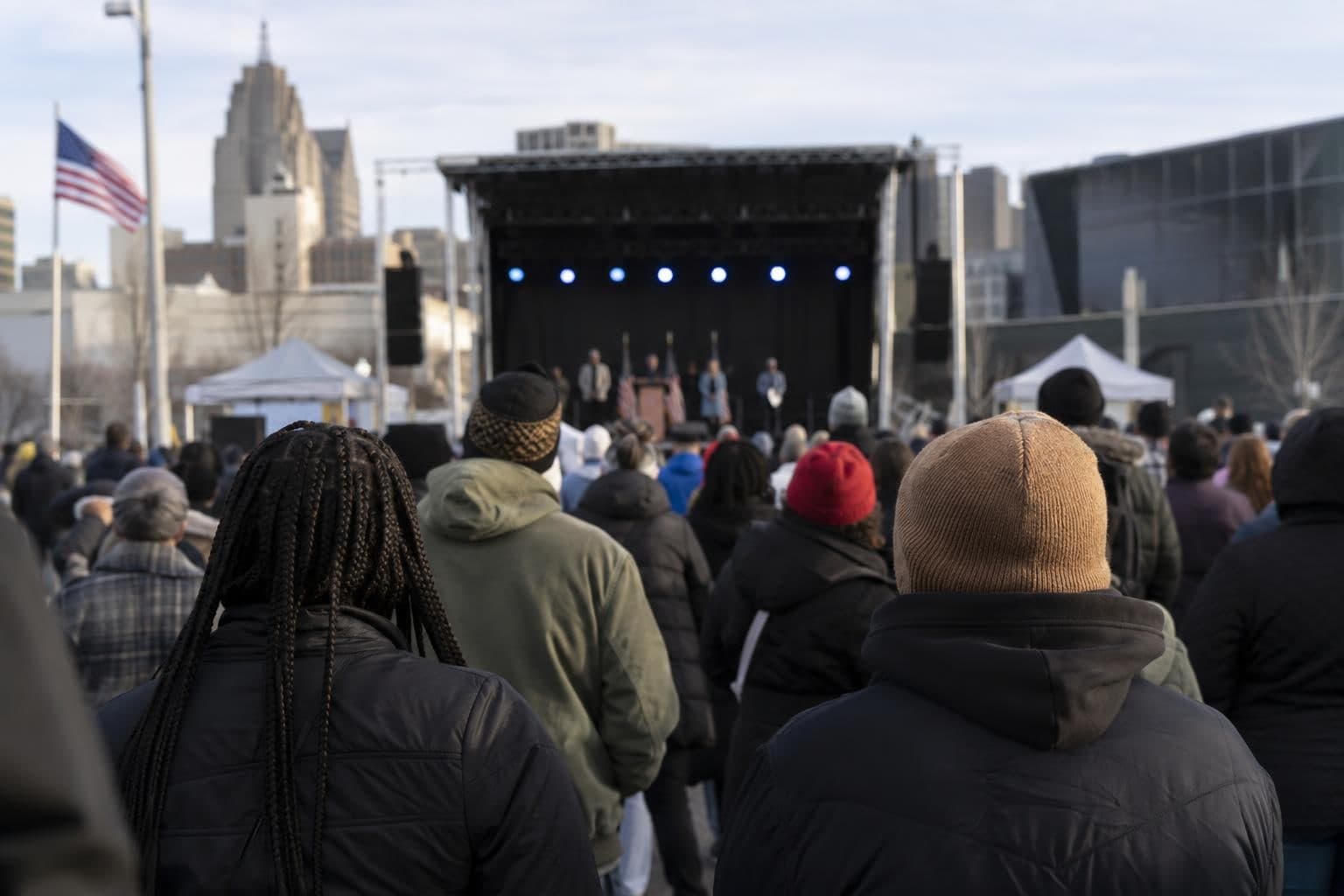 Attendees face a stage at a campaign rally in Detroit.