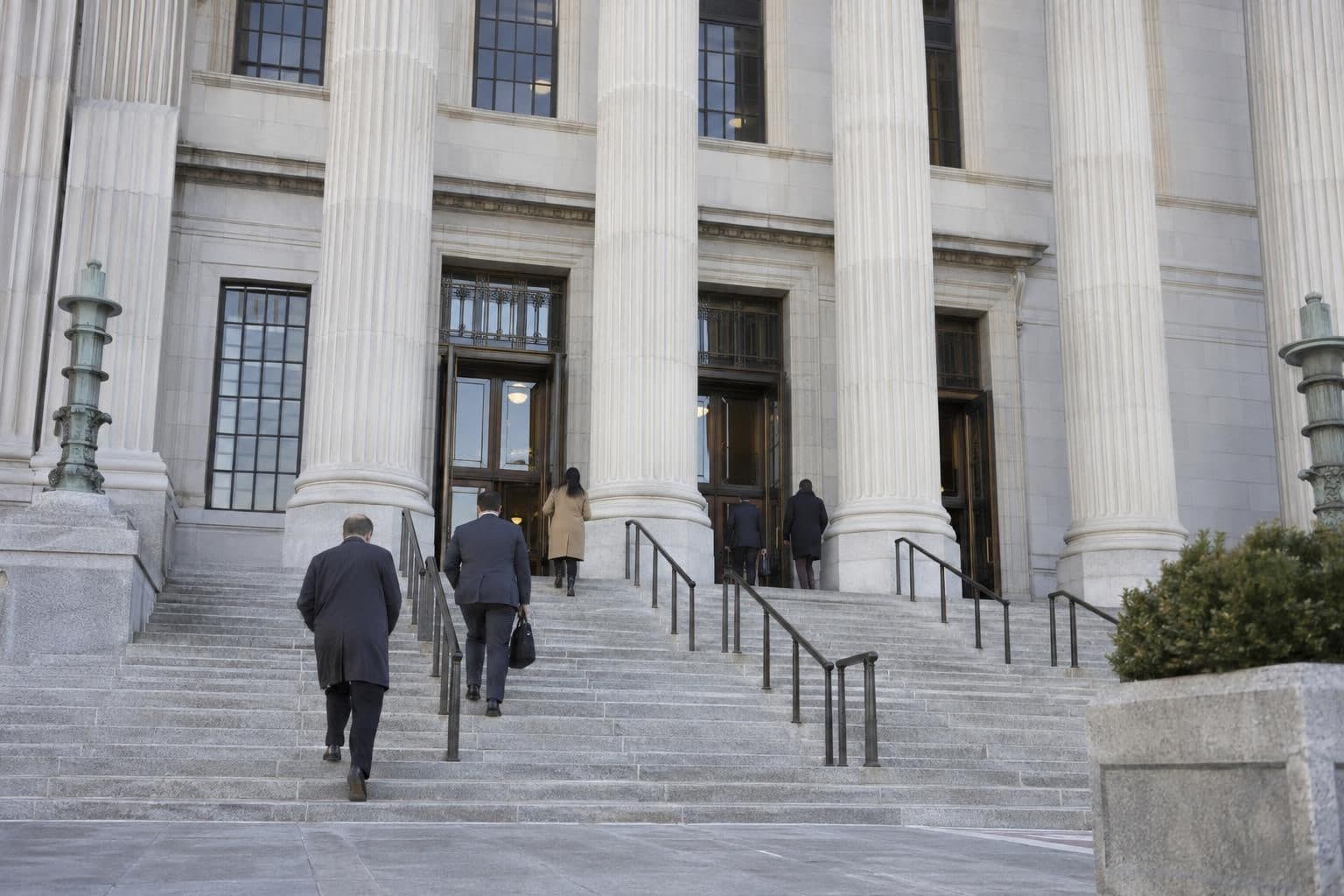 Exterior of an unidentified federal courthouse illustrating a ruling on voter-roll data collection.