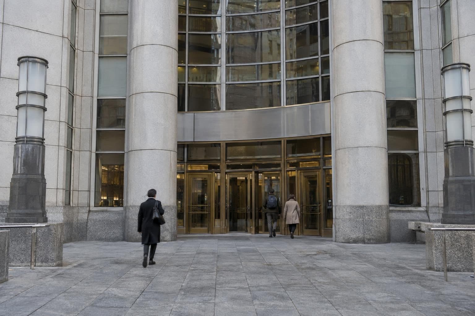 Federal courthouse exterior illustrating a court order restricting deportation and transfers.